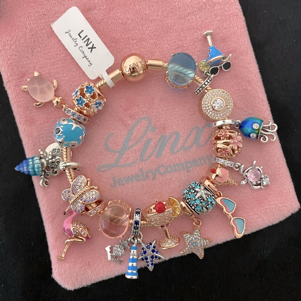 Linx Rose Gold Bracelet with Ocean and Beach Themed Charms